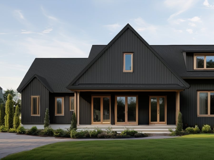 Black house with a pointed roof and natural wood trim.